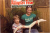 holding a live albino alligator at the Farm 2007