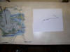 Cross Stitch Project and formerly gray thread and needle